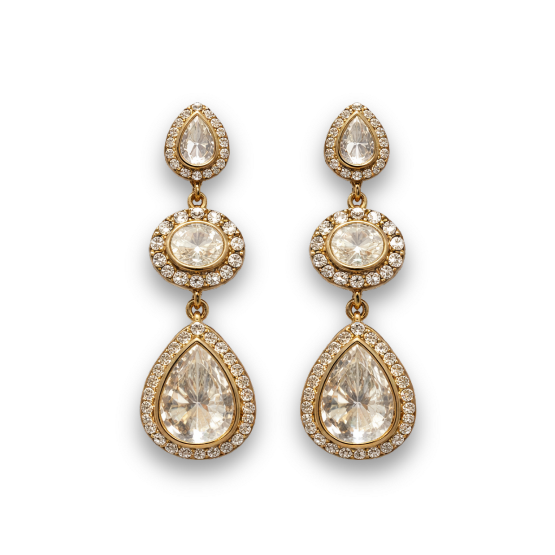 Gold teardrop earrings with clear gemstones on a white background